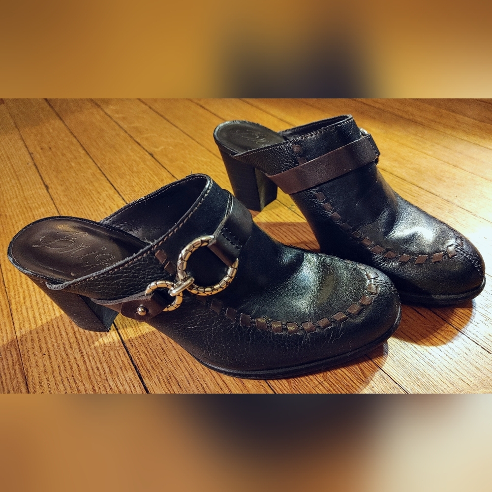 Brighton: Chic Black Leather Women's Mules with Buckle Detail
